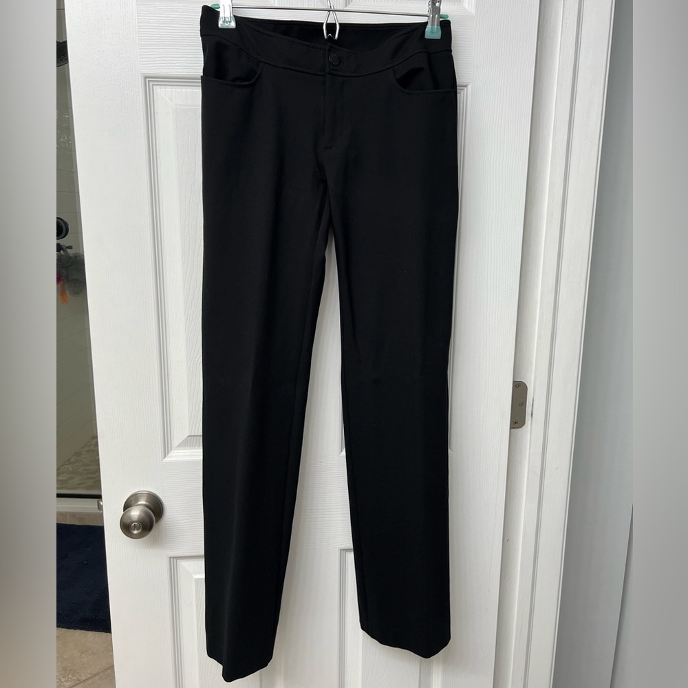 Anne Klein black boot-cut mid-rise dress pants, button and zipper closure.